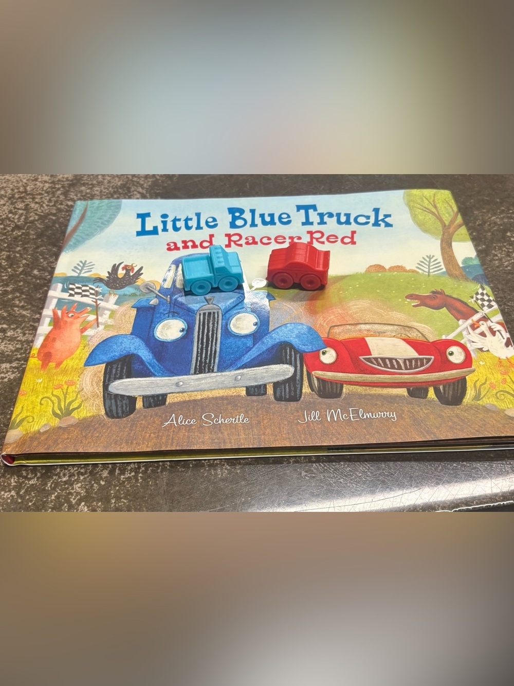 New hardcover copy of Little Blue Truck & Racer Red by Alice Schertle RT 19.99